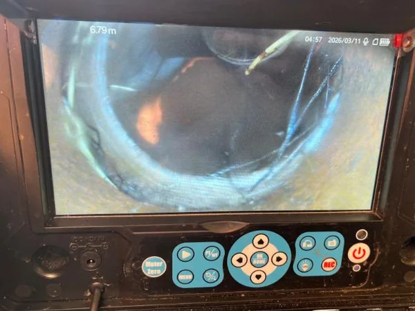 Drain camera screen showing the inside of a blocked pipe at 6.79 metres