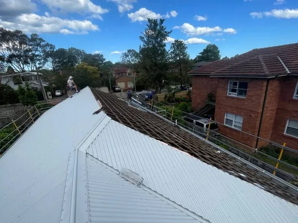 New metal roof sheets laid on a North Shore house