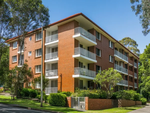 Red brick walk-up apartment block on the Lower North Shore