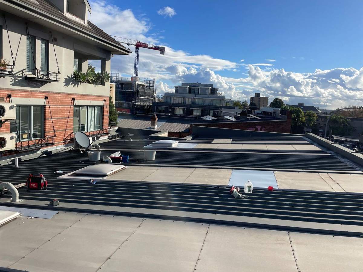 A commercial roof and plant area on a North Shore building