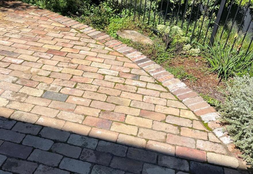 Brick paved driveway relaid over a completed sewer repair