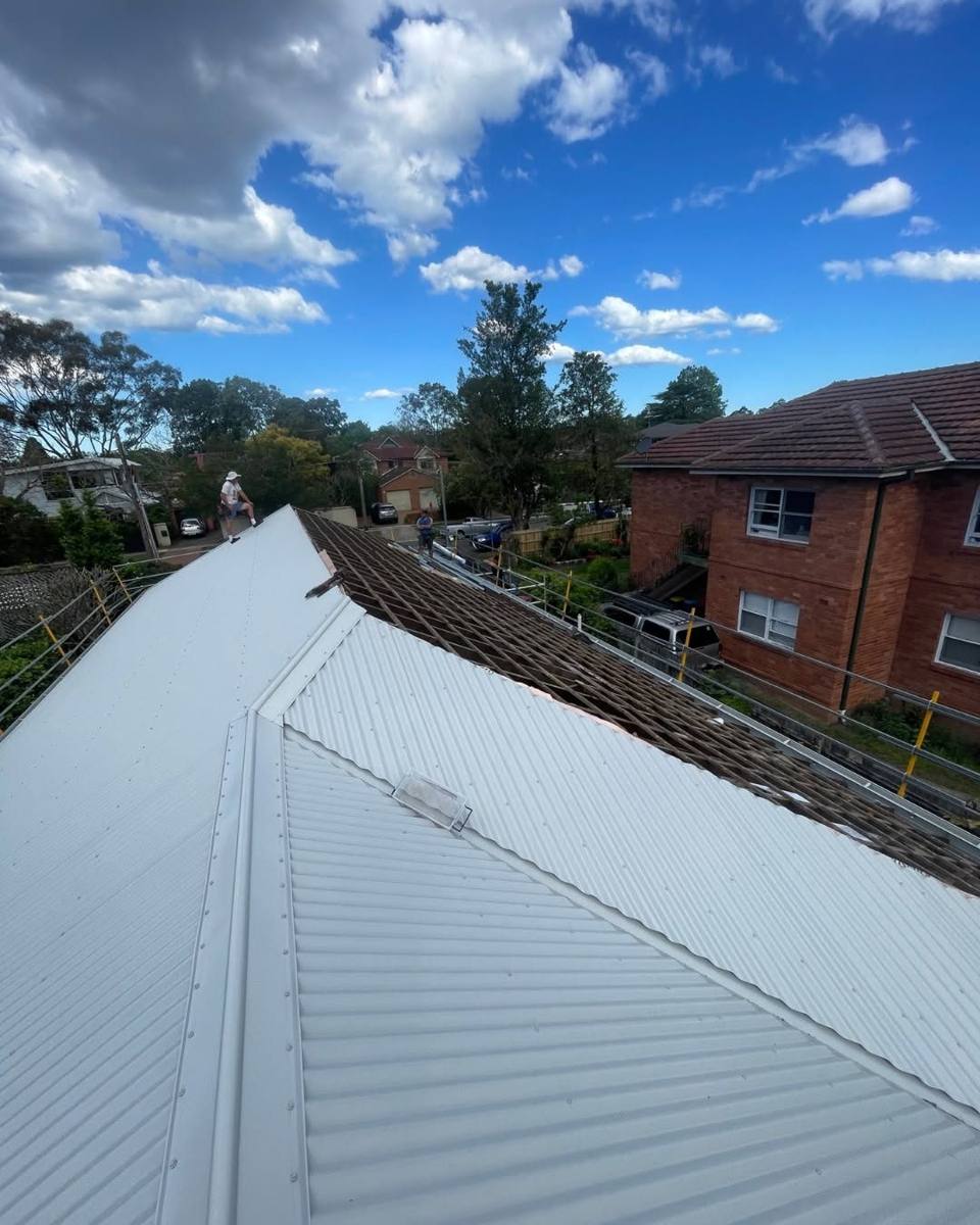 A new metal roof finished, replacing the old tiles